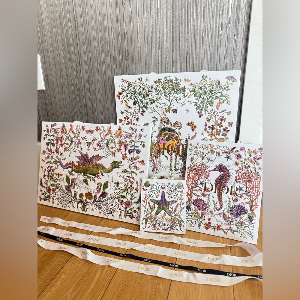 Assorted collectible Christian Dior holiday packaging by artist Jardin d’Hiver.